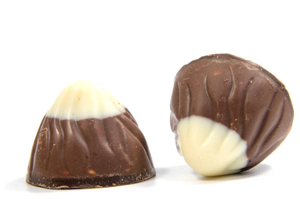 istock Chocolate candies isolated on white background. 644070590