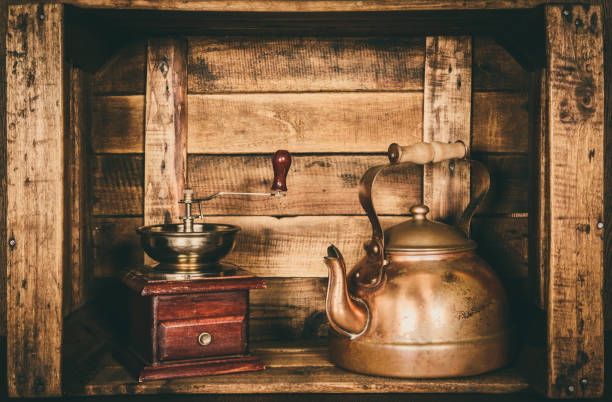 istock Kettle teapot retro vintage old, inside a wooden box, style window 644077350
