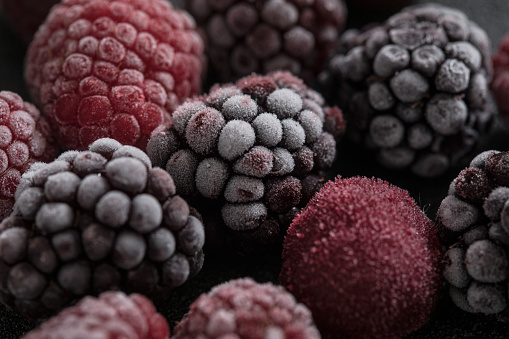 Close-up to frozen berry fruit.