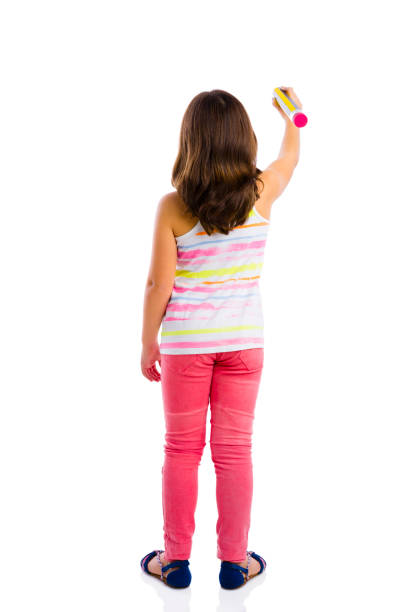 istock Girl writing on a glass wall 644086418