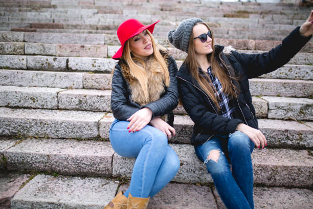 istock Girls taking selfie outside 644090394