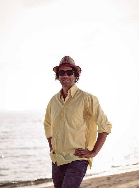 istock Relaxing and walking down the sea shore 644099092