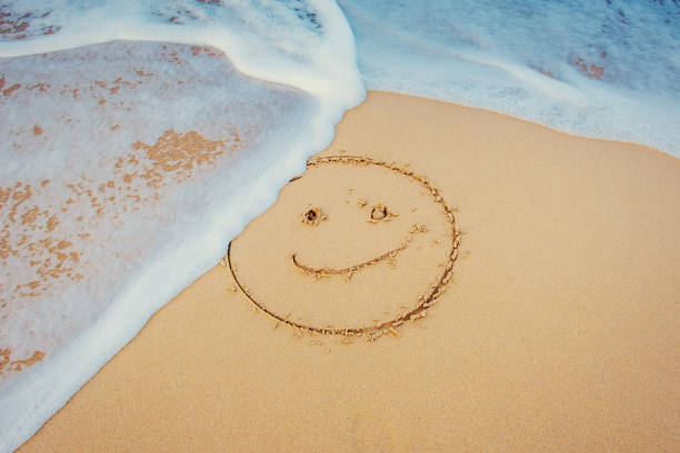 istock The drawings in the sand at the beach 644109186