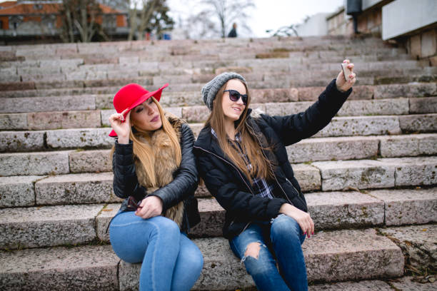istock Girls taking selfie outside 644111834