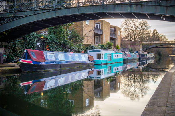 istock British water canal with house boats 644115618