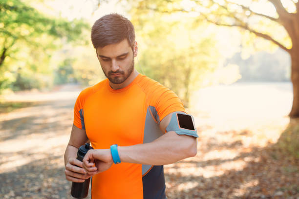 istock Sportsman using a smart watch 644115658