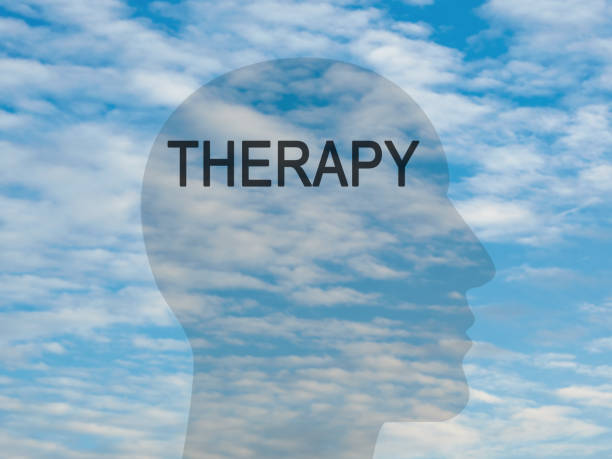 istock Word Therapy On Transparent Head Silhouette Against Cloudy Sky, illustration 644118402