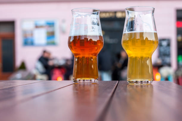 istock two glasses of beer on table edge 644118900
