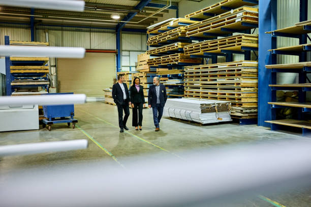 istock Business people in distribution warehouse 644126258