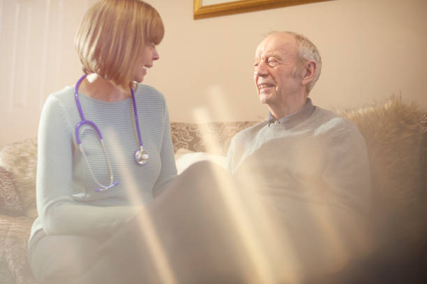 istock Senior male chatting to doctor 644128774