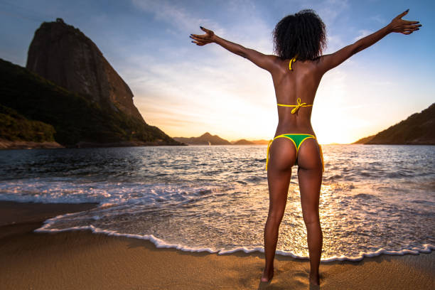 istock Brazilian Girl in Bikini With Open Arms 644135352