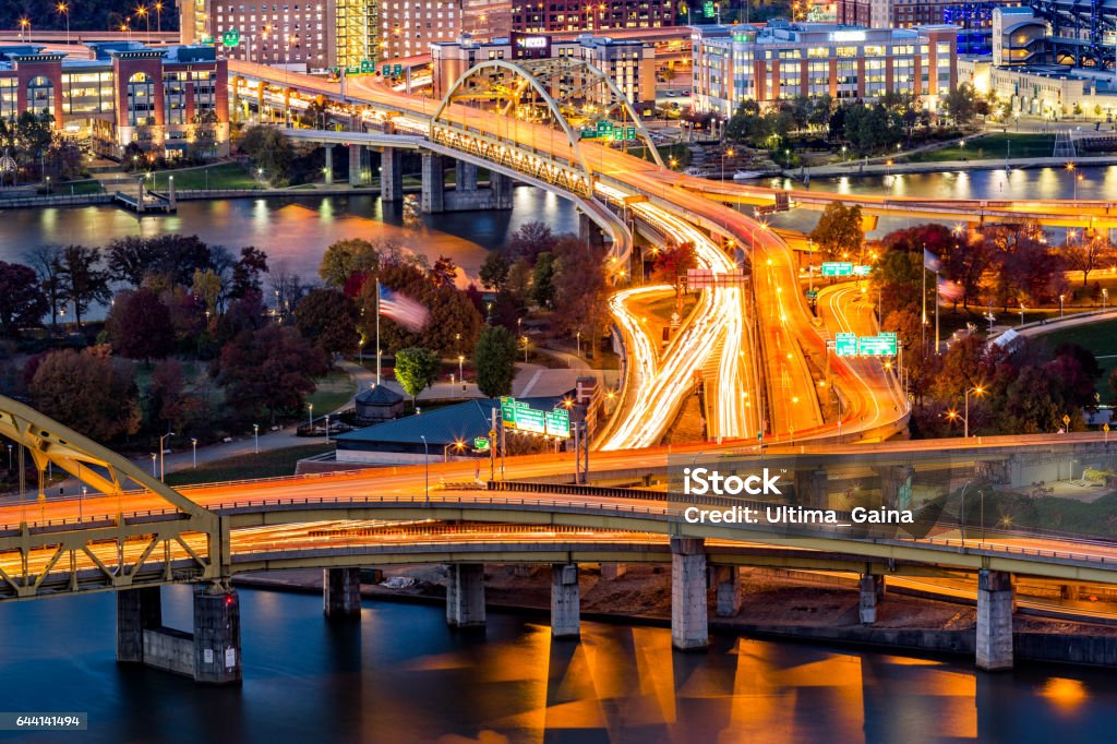 Pittsburgh traffic trails Pittsburgh traffic trails on the highway junction between Fort Duquesne and Fort Pitt bridges Highway Stock Photo