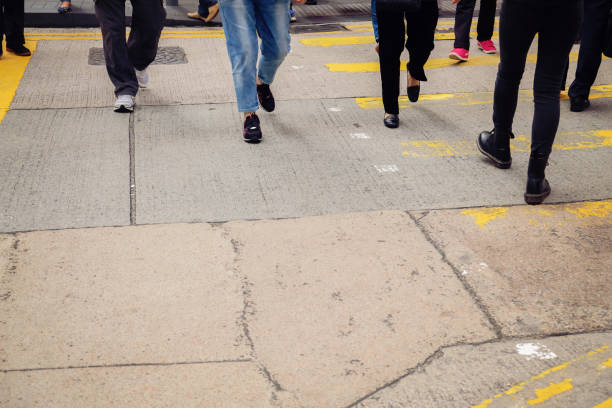 istock crossroad with walking pedestrians, toning 644152294