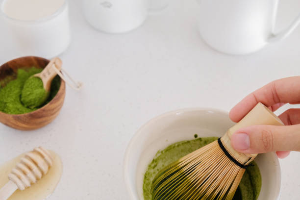 istock matcha green tea latte ingredients, healthy trendy drinks, copy space background 644154442