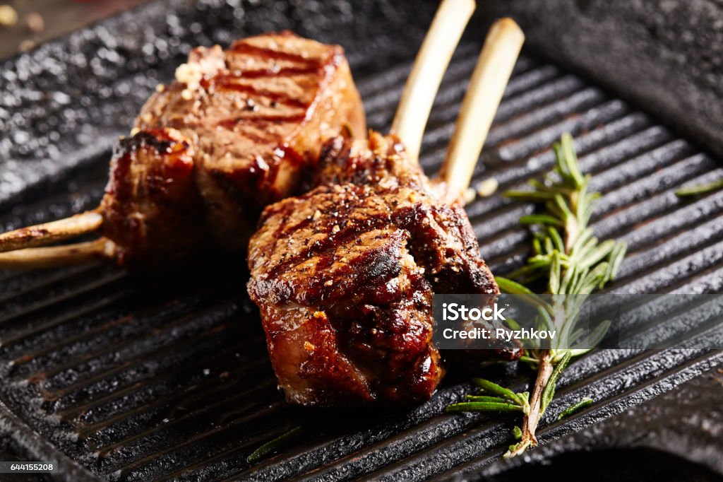 Rack of Lamb Barbecue Grilled Food - Rack of Lamb Barbecue on Black Grilled Pan Meat Chop Stock Photo