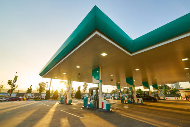 gas station at sunrise morning . - station imagens e fotografias de stock