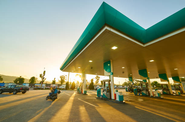 istock Gas station at sunrise morning . 644155330