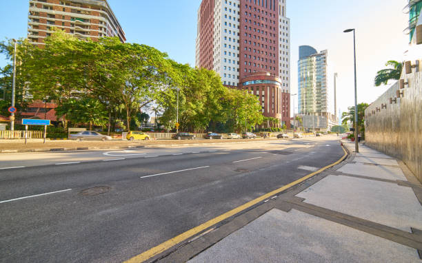 istock Empty asphalt road and modern buildings in Kuala Lumpur,Malaysia. 644155348