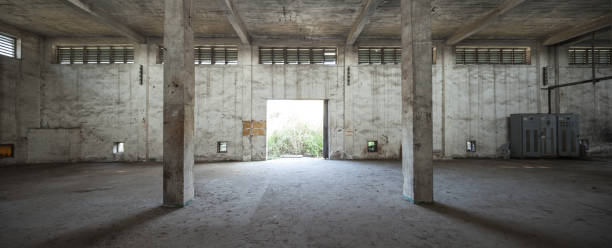 istock Interior of old and abandoned factory warehouse 644180104