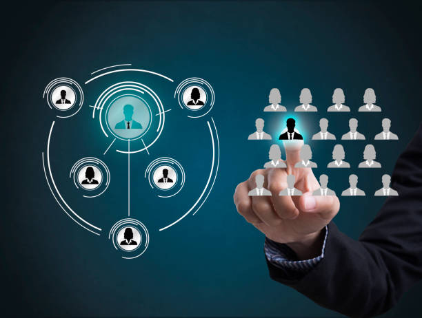 istock Businessman hand pressing icon people on networking system concept 644185264
