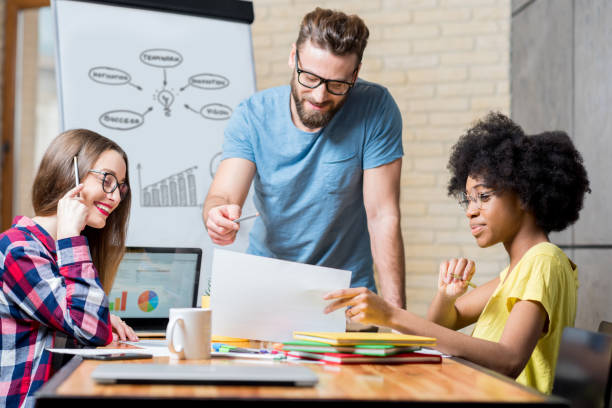 istock Coworkers working indoors 644188960