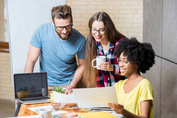 istock Coworkers working indoors 644189052