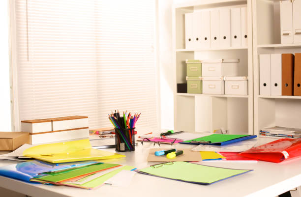 istock Office workplace with laptop and glasses on wood table 644189794