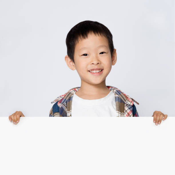 istock isolated naughty boy on white background 644190754