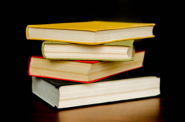 istock a stack of colorful books in a library or a room 644196478