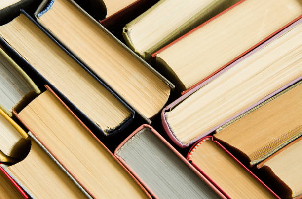 istock a stack of colorful books in a library or a room 644196588