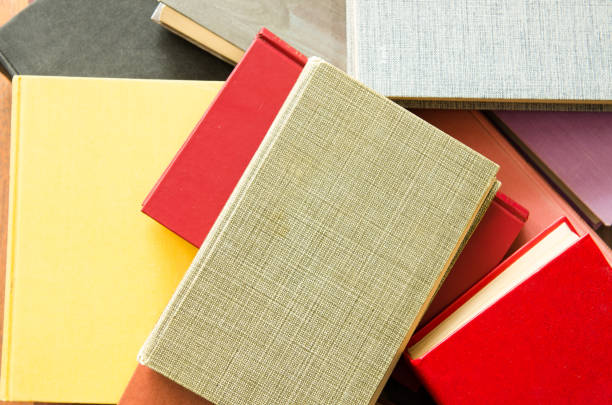 istock a stack of colorful books in a library or a room 644196716
