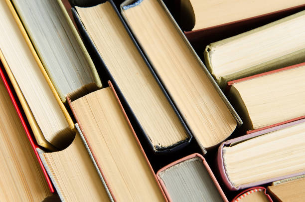 istock a stack of colorful books in a library or a room 644196744