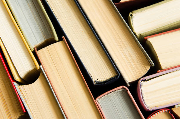 istock a stack of colorful books in a library or a room 644196818
