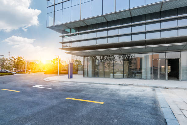 istock empty asphalt road along modern business buildings 644220356