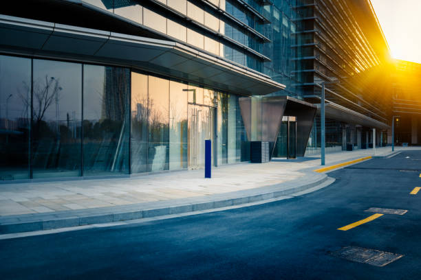 istock empty asphalt road along modern business buildings 644220854