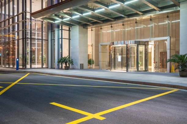 istock empty asphalt road along modern business buildings 644221332