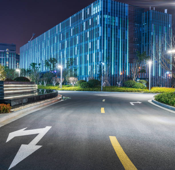 istock empty asphalt road along modern business buildings 644223962
