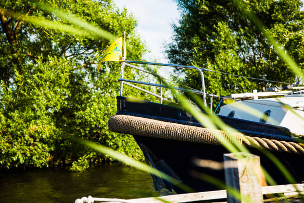 istock Motor boat bow on canal in Holland 644225550