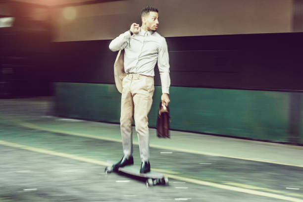 istock Businessman on a skateboard 644238042