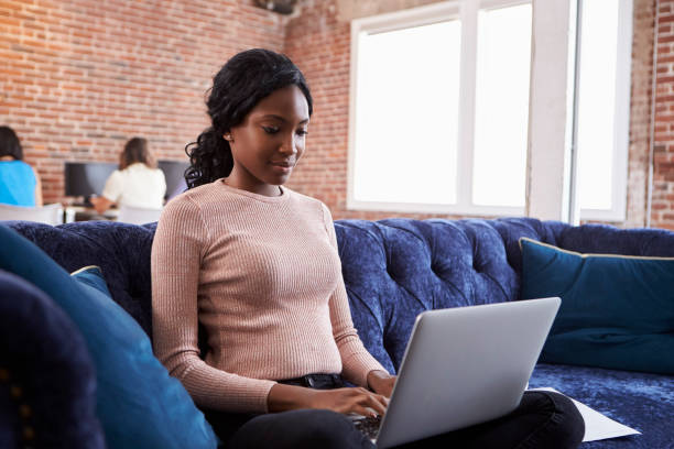 istock Businesswoman Working On Sofa In Modern Creative Office 644244868