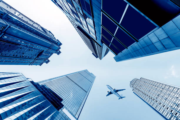 istock Tall buildings and airplanes 644254898