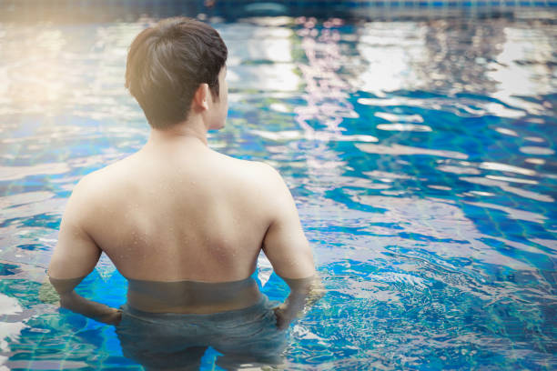 istock Man Enjoy In The Pool 644258798