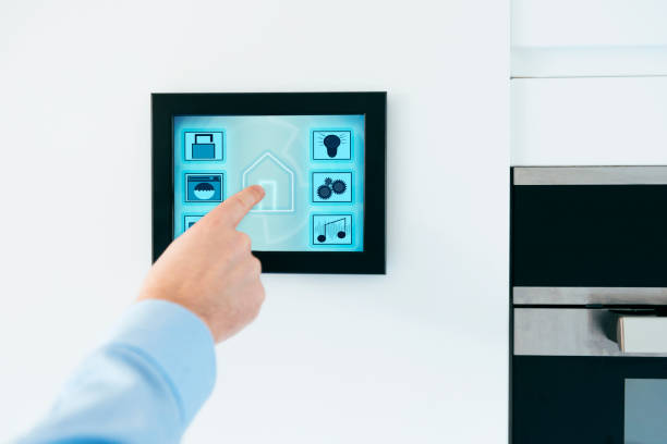 istock Internet of things in smart home with display on wall 644263236