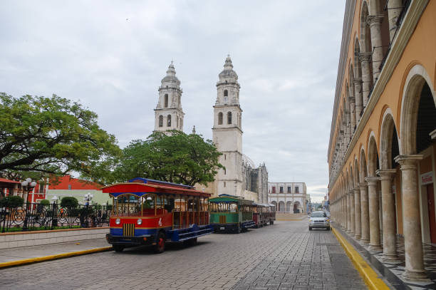 istock Independence Plaza, tourist trains and cathedral 644263384