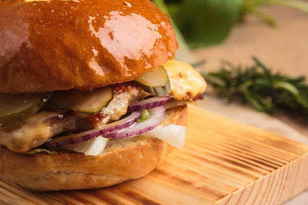 istock Trendy glossy burger with chicken 644264934