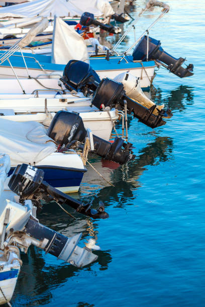 istock Outboard engines on fishing boats 644267366