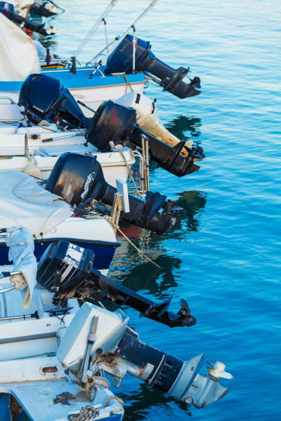 istock Outboard engines on fishing boats 644267432
