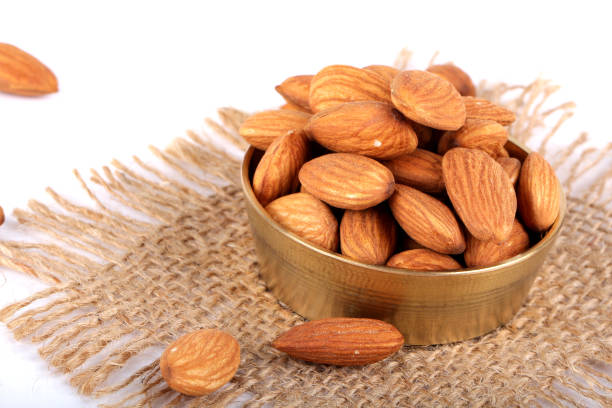 istock almond, almond in bowl 644272860