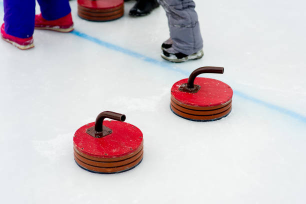 istock Young girls playing curling 644275848