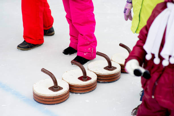 istock Young girls playing curling 644275968